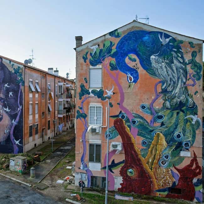 Art & Craft: Beer Tour with Street Art in Rome - Via del Pigneto murals: Atoche and Solo in full focus