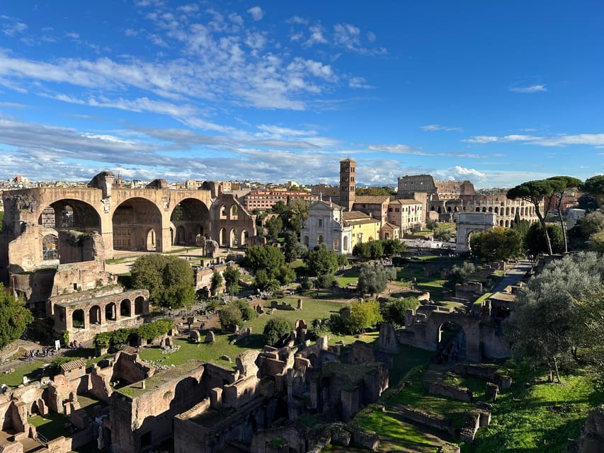 Colosseum and Ancient Rome Discovery Guided Small-Group Tour - Via Sacra and the Roman Forum: the practical center of ancient Rome
