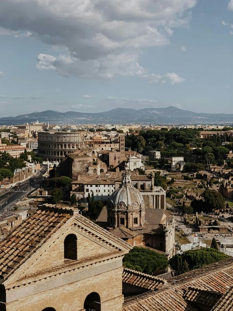 Colosseum Entry with digital audioguide and arena option - Palatine Hill stops: Palatine Museum, Aula Isiaca, and Loggia Mattei