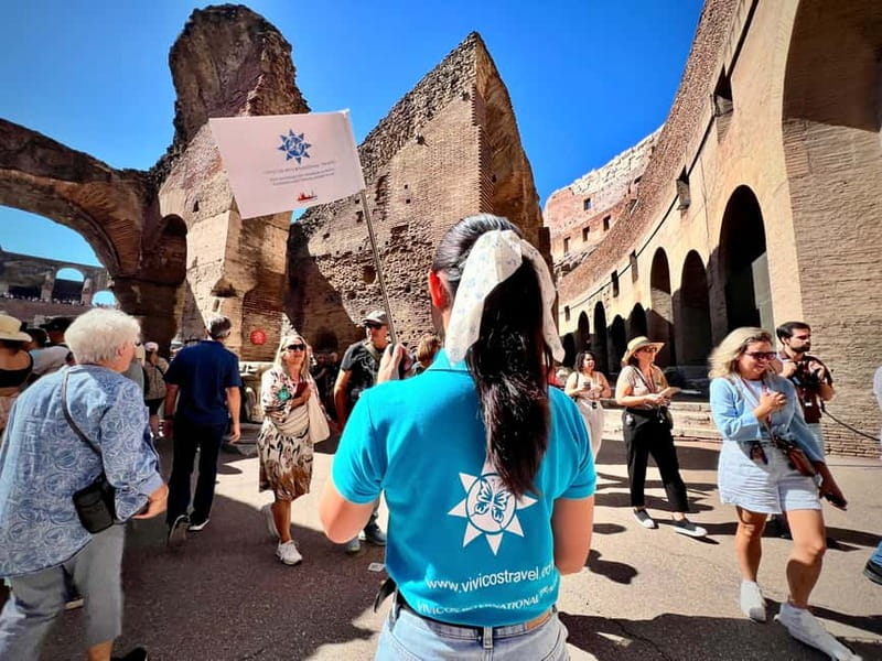 Colosseum, Roman Forum & Palatine Hill: AudioGuide & Host - Meeting at Via dei Fori Imperiali: find the light-blue vest