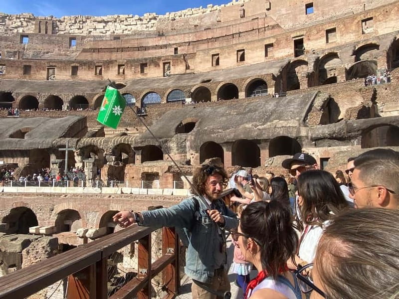Colosseum, Roman Forum & Palatine Hill: AudioGuide & Host - Audio guide setup: smartphone, headphones, and the headsets you get
