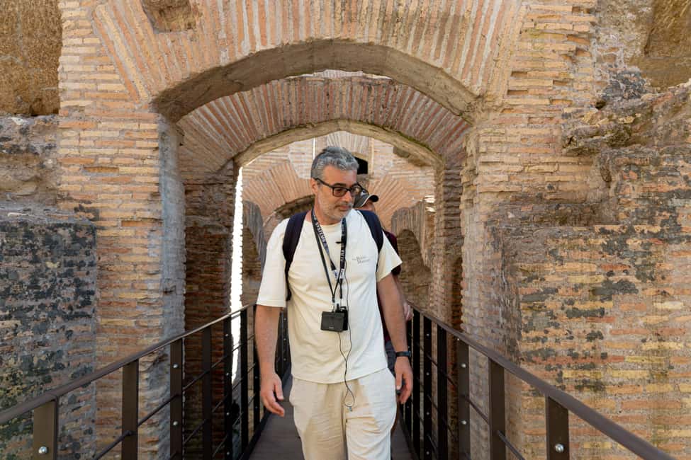 Colosseum Special Access Tour, with Ancient Temples & Tombs - Entering the Colosseum through the Gladiators route