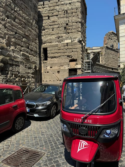 E-Tuk Tour: Rome by Night - Colosseum at night: lit up and less chaotic