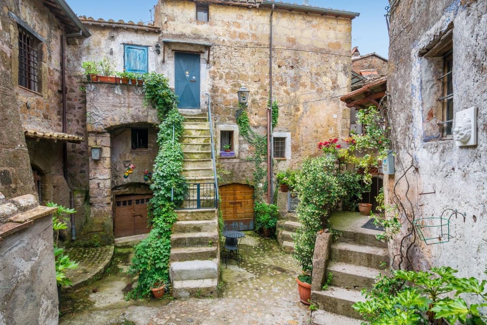 From Rome: Bracciano Lake & Calcata Day Trip, Wines & Lunch - A private Rome-to-Lazio day with real countryside stops