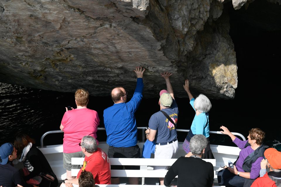 From Rome: Capri and Anacapri Guided Tour and Island Cruise - The 1-hour boat cruise: Vesuvius views, Faraglioni, and the grotto circuit