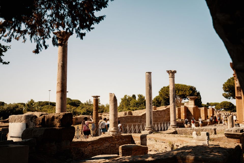 From Rome: Ostia Antica 4-Hour Guided Tour - Temples and intact shops: mosaics, freshness of the layout, and the details that stay