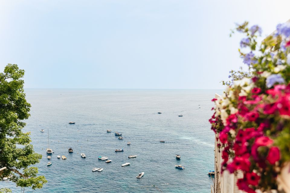 From Rome: Pompeii, Amalfi Coast and Positano Day Trip - Positano free time: Santa Maria Assunta, shops, and beach reality