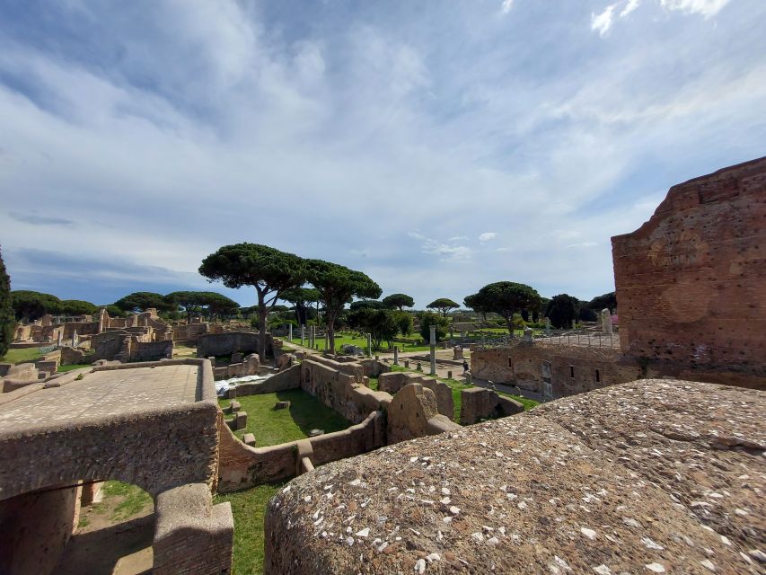 Ostia Antica: Archaeological Guided Private Tour - Capitolium And Forum Square: Where Romans Performed Civic Power