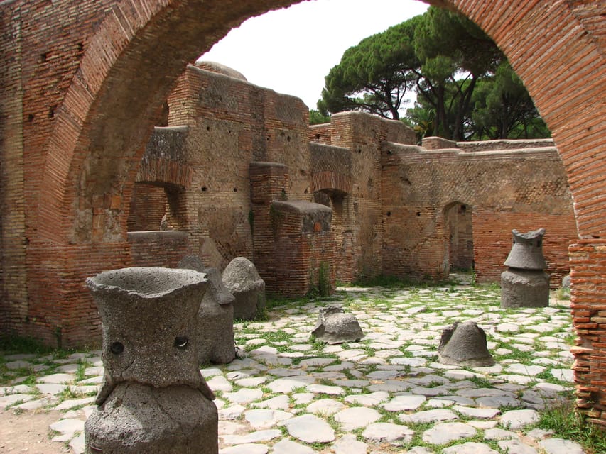 Ostia Antica: Small group tour from Rome - The Square of the Guilds: where trade meets public space
