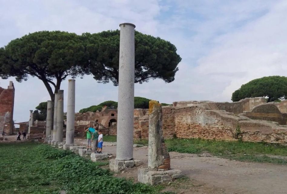 Rome: Ancient Ostia, Archeology and History, Half Day Tour - The Decumanus Maximus walk: street life, direction, and scale
