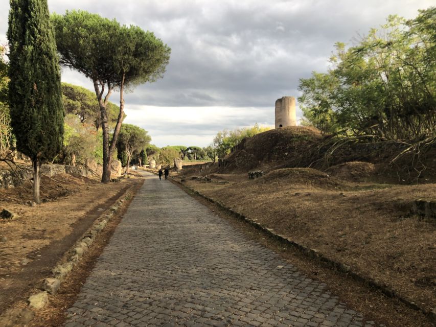 Rome: Appian Way E-Bike Tour Catacombs, Aqueducts & Picnic - Riding the Via Appia Antica: countryside views with ancient road under your wheels