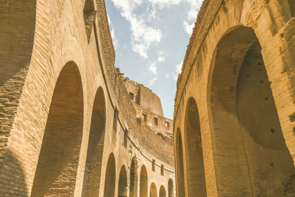 Rome: Colosseum and Roman Forum Small Group Tour in German - Entering The Colosseum: Skip the Line, Then Get the Story