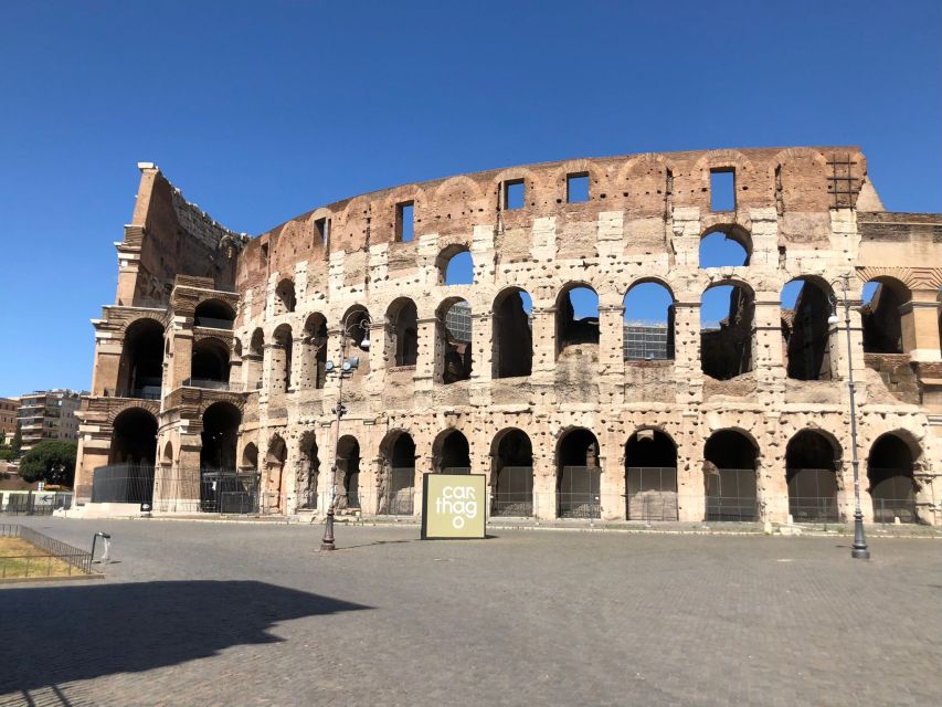 Rome: Colosseum, Forum, and Palatine Hill Guided Tour - Inside the Colosseum: gladiators, wild beasts, and imperial shows