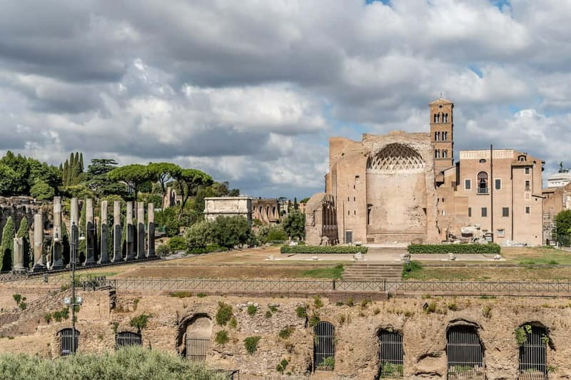 Rome: Colosseum & Forum Small Group Tour with Palatine Hill - Wandering the Roman Forum: Temples, Columns, and Political Power