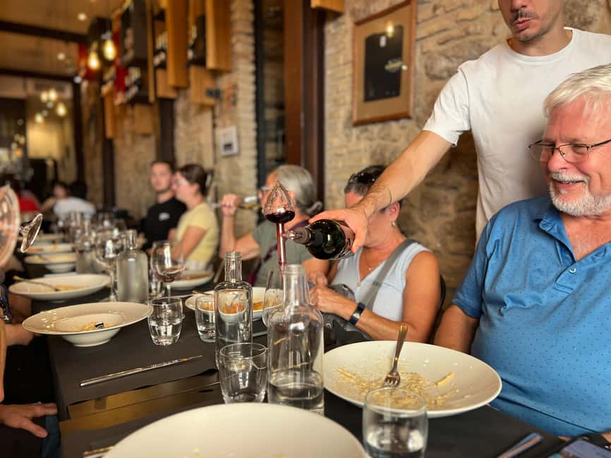 Rome: Food Tour with Unlimited Food and Barolo Wine - Bruschette and street bites: tasting the oils and pesto
