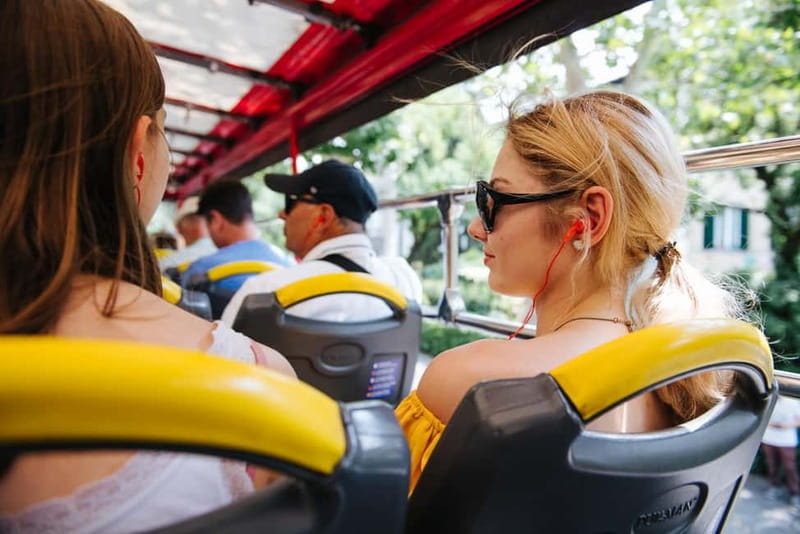 Rome Hop On Hop Off Tour from Civitavecchia by Train - What you actually get on the bus: recorded commentary in 8 languages