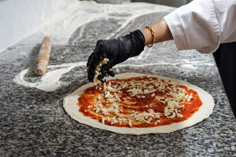 Rome: Pizza and Tiramisu Cooking Class in Piazza Navona - Tiramisu from scratch: assembling layers the right way