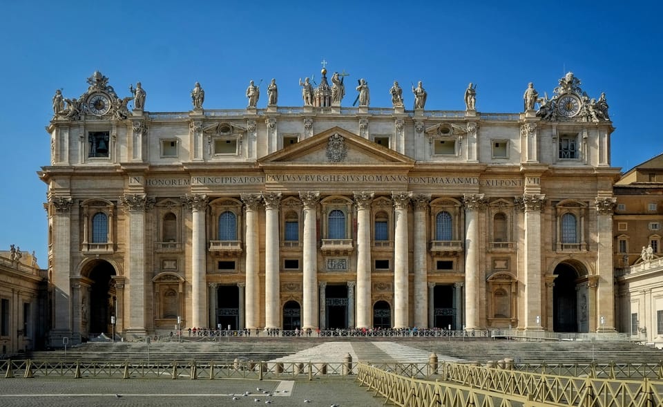 Rome: Saint Paul Outside the Walls Tour - Inside the basilica: golden mosaics, the triumphal arch, and Pope medallions